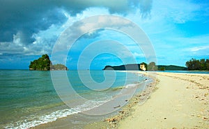 Island Swallowed by Bright Blue Sky, Krabi, Thailand.