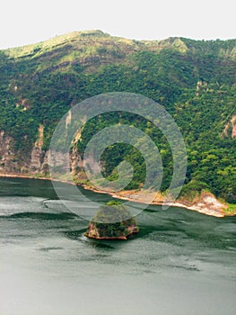 Island within taal volcano caldera lake photo