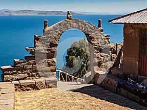 Island Taquile with typical stone arch, Lake Titicaca, Puno region, Peru