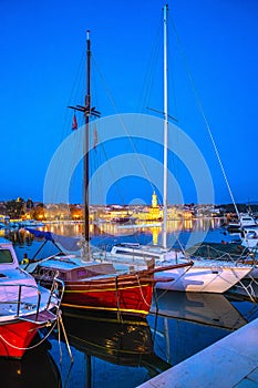 Island town of Krk harbor evening waterfront view