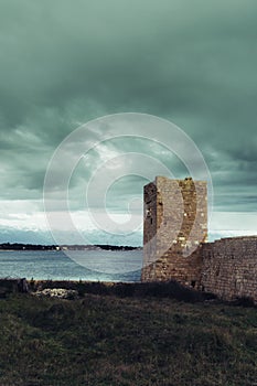 Island of Vir fortress ruins in stormy weather, Dalmatia, Croatia