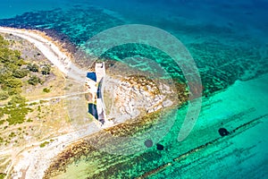 Island of Vir stone beach and fortress ruins aerial view