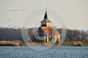 Island witch church in water reservoir Nove,Mlyny