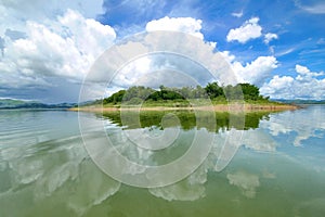 The Islands and mountains on reservior in dam. On the day of clouds and cloud reflection in the beautiful water of  KaengKrachan