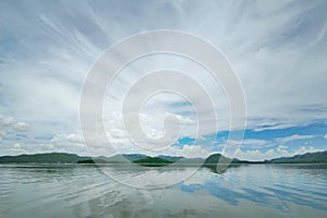 The Islands and mountains on reservior in dam. On the day of clouds and cloud reflection in the beautiful water of  KaengKrachan