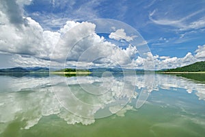 The Islands and mountains on reservior in dam. On the day of clouds and cloud reflection in the beautiful water o