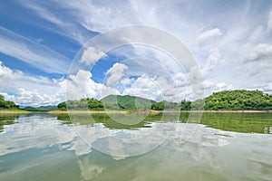 The Islands and mountains on reservior in dam. On the day of clouds and cloud reflection in the beautiful water o