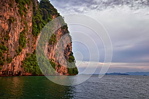 Islands Sunset, Ocean panorama views near Phuket with deep Red, Orange, Purple and Blue, mountains, twilight in Thailand. Includin