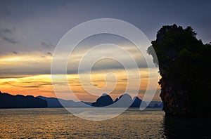 Islands Sunset, Ocean panorama views near Phuket with deep Red, Orange, Purple and Blue, mountains, twilight in Thailand. Includin