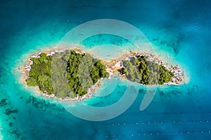 Islands with trees in the middle of the sea. Turquoise water in the Mediterranean Sea.