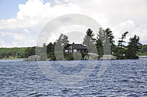 Isle with Smallest Bridge between Border USA and Canada from Thousand Islands Archipelago