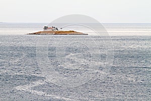 Islet, Church and Ocean photo