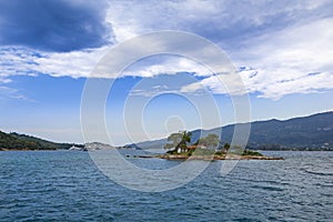 Islet Daskalio at Poros island photo