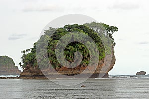 An islet, a very small and uninhabitable island