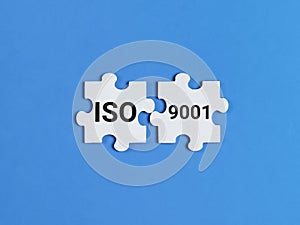 ISO 9001 certification on jigsaw puzzle pieces