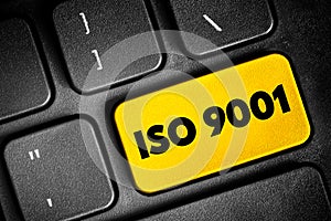 ISO 9001 - international standard that specifies requirements for a quality management system, text concept button on keyboard