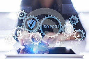 ISO 9001 Standards quality control business technology concept on virtual screen.