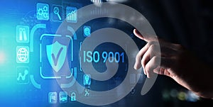 ISO 9001 Standards quality control business technology concept on virtual screen.