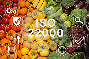 ISO 22000 - Food safety management. Assortment of fresh fruits and vegetables as background, top view