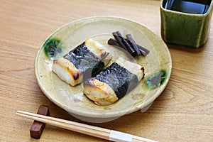 Isobeyaki, grilled mochi japanese rice cake wrapped in nori seaweed photo