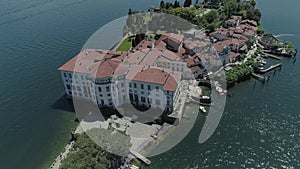 Isola Bella castle Passenger ship voyage on the mountain Italy lake, drone 4k nature flight