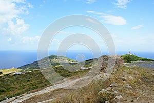 Isola del Giglio, Italy: Panoramic view with a lighthouse in the background photo