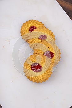Isolate baked jam biscuits row photo