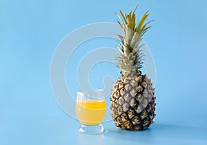 Isolate exotic pineapple on blue background