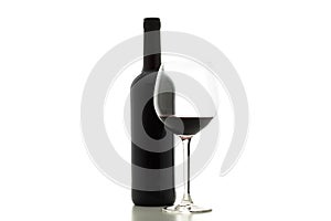 Isolate glass of red wine and bottle on white background