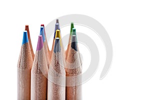Isolate of multicolored wooden pencils. Pencils of different colors stand out against a uniform white background, for