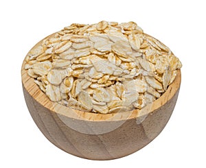 isolate of oat flat peeled in a wooden bowl