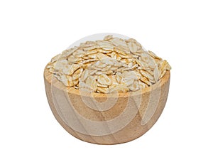 isolate of oat flat peeled in a wooden bowl