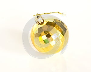 Isolate of ornament object for decoration on Christmas tree, yellow ball