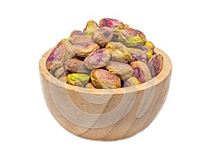 isolate of pistachio in a wooden bowl