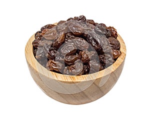 isolate of raisin in a wooden bowl