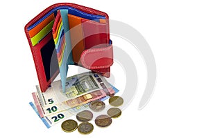 Isolate on white background. EU cash. Banknotes of 5, 10, 20 euros. Some coins. Woman`s red wallet