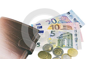 Isolate on white. EU cash. Banknotes of 5, 10, 20 euros. Some coins. Man`s brown wallet