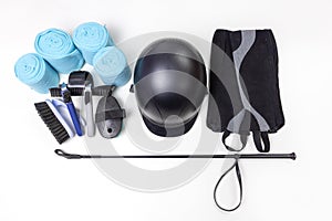 Isolated accessories and equipment for horse care and riding on the white background