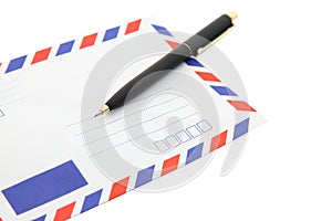 Isolated air mail envelope with pen
