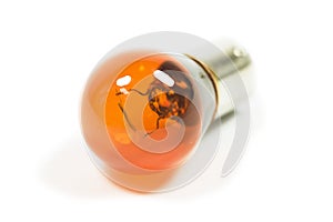 Isolated amber lightbulb