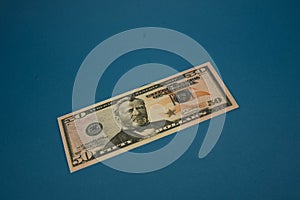 Isolated american fifty dollar bill on blue background