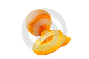 Isolated apricots. Two fresh whole apricot fruits and half isolated on white background with clipping path