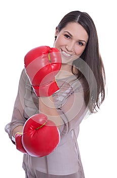 Isolated attractive businesswoman with red boxing gloves.