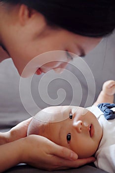 Isolated background Asia Chinese adorable cute toddler baby boy son child with his beloved mom mother maternal love nursing