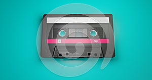 Isolated background image of old classic cassette tape with blank label in vintage and retro audio recording and music storage