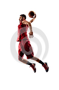 Isolated basketball player in action is flying