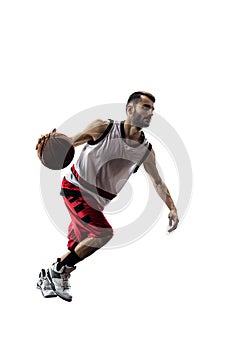 Isolated basketball player in action is flying