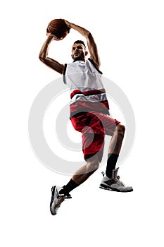 Isolated basketball player in action is flying