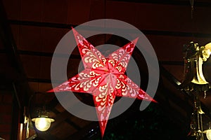 Isolated Beautiful Red Christmas Star Ornament