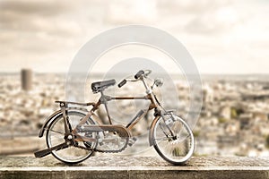 Isolated bicycle in urban sidewalk